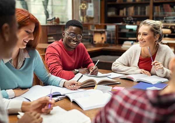 students meeting at table